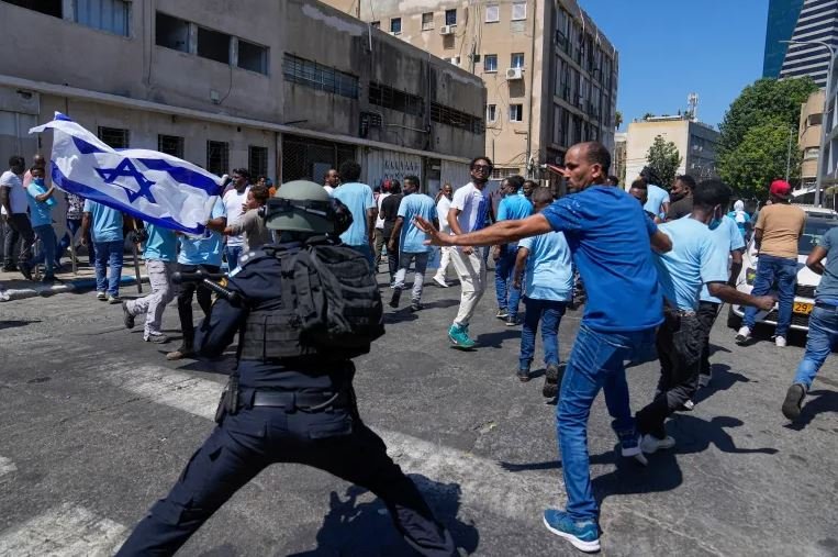 Dozens of people injured in clashes between rival Eritrean groups in Israel