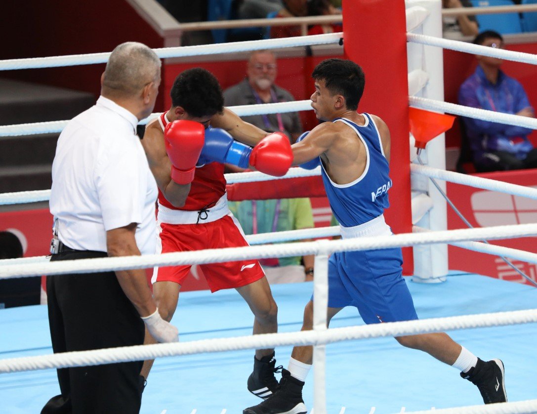 Nepalese boxer Rabin proceeds to next round beating Indonesian boxer