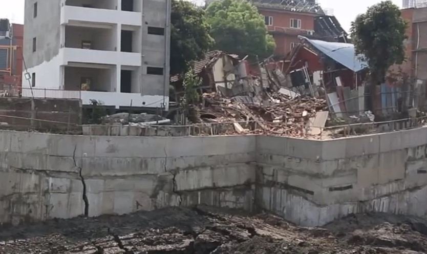 Surrounding houses sunk down during construction of Summit Apartment in Lalitpur