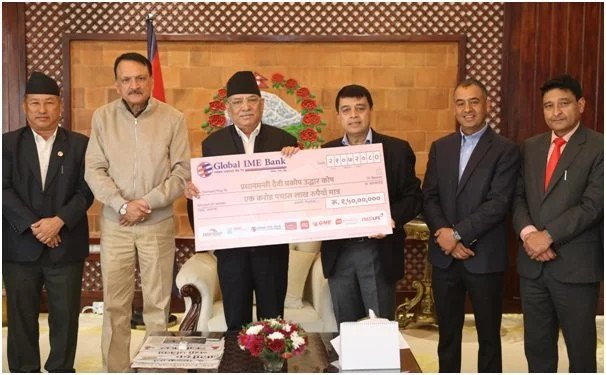 IME Group hands Rs 15 million cheque to PM disaster relief fund