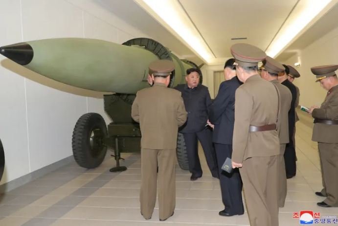 Kim urges N Korean experts to produce ‘powerful nuclear weapons’