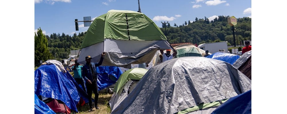 Hundreds of asylum-seekers are camped out near Seattle