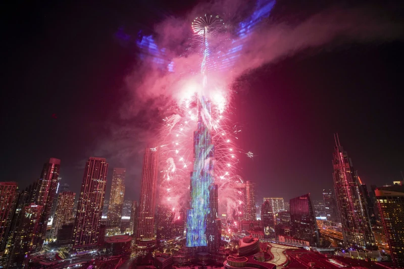 The world welcomes 2025 with light shows, embraces and ice plunges