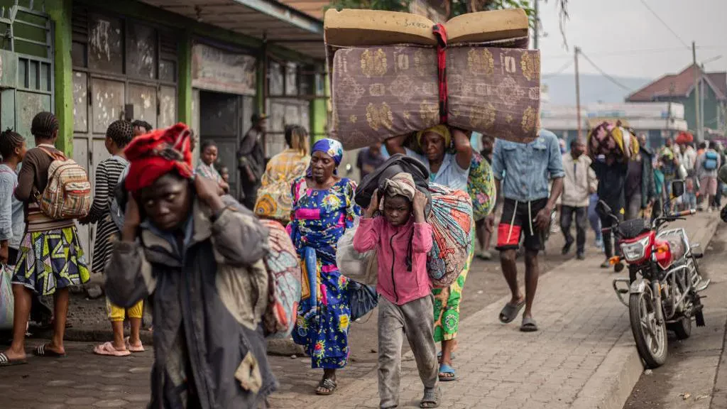 Rebels say they have taken DR Congo city as thousands flee