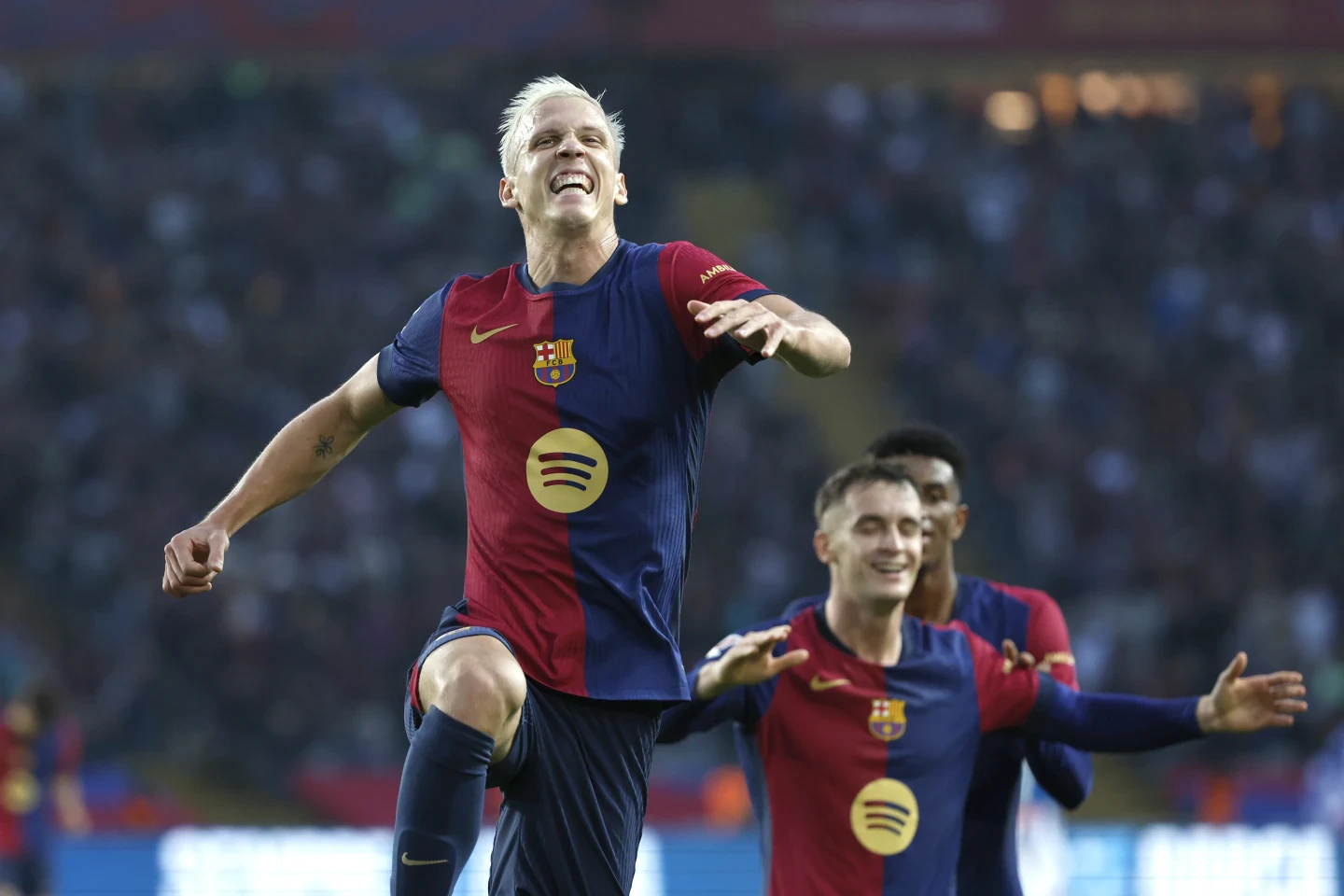 Dani Olmo leads Barcelona to city derby win over Espanyol