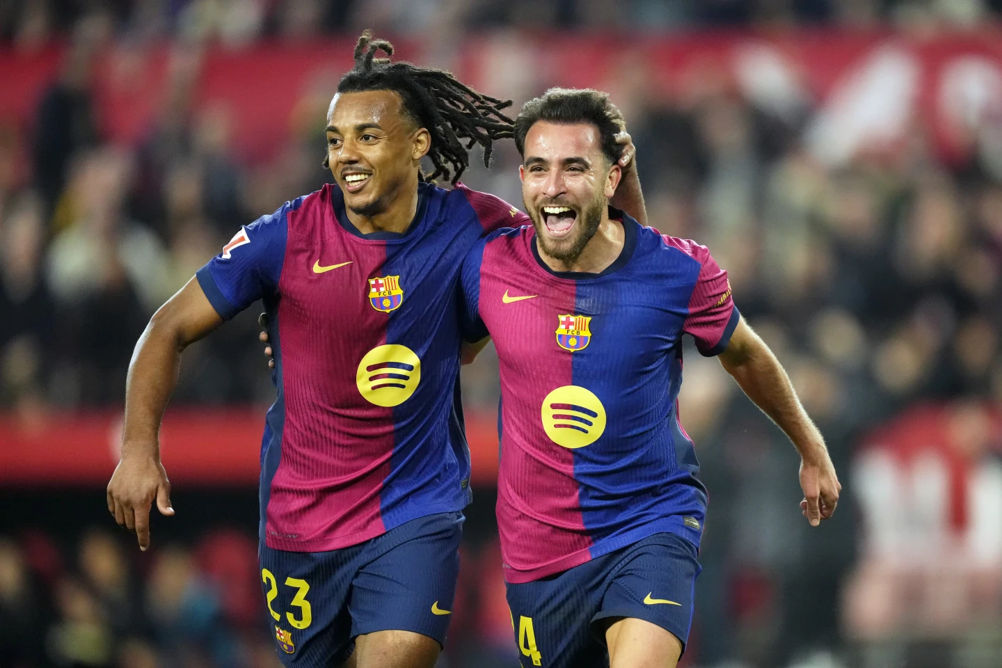 Barcelona inches closer to Madrid rivals with 4-1 win at Sevilla