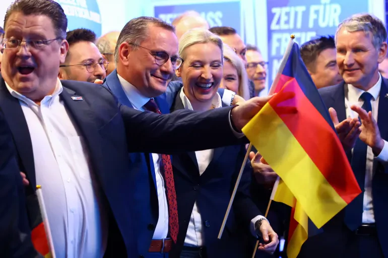 Germany's conservatives celebrate, but far right enjoy record result