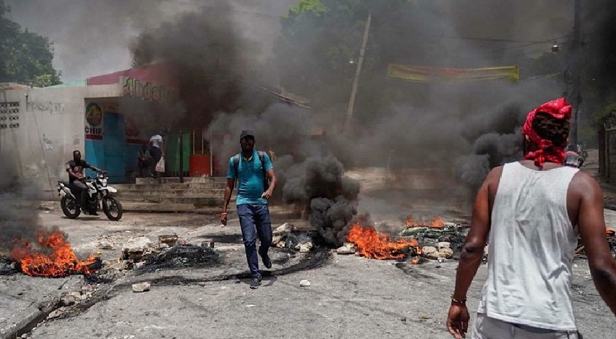 Two killed, 5,000 flee as Haiti gangs attack in Port-au-Prince