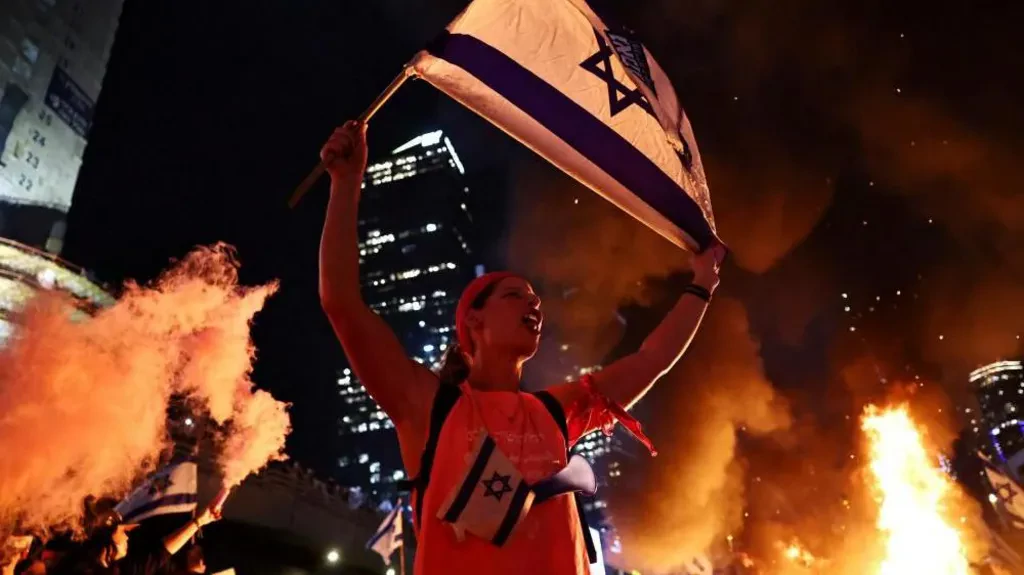 Protests erupt in Israel after Netanyahu fires defence minister