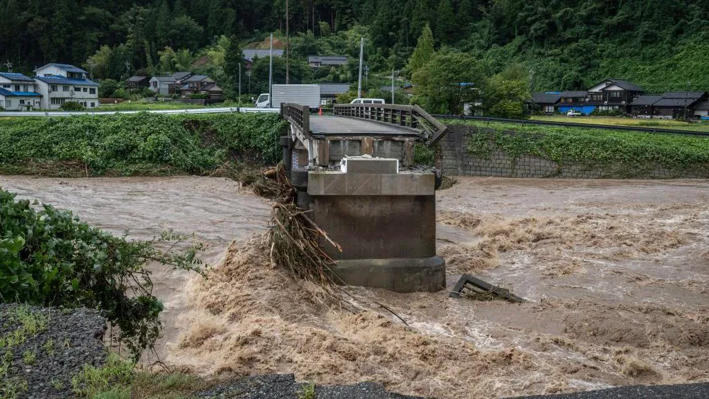 Six dead after record rain causes floods in Japan