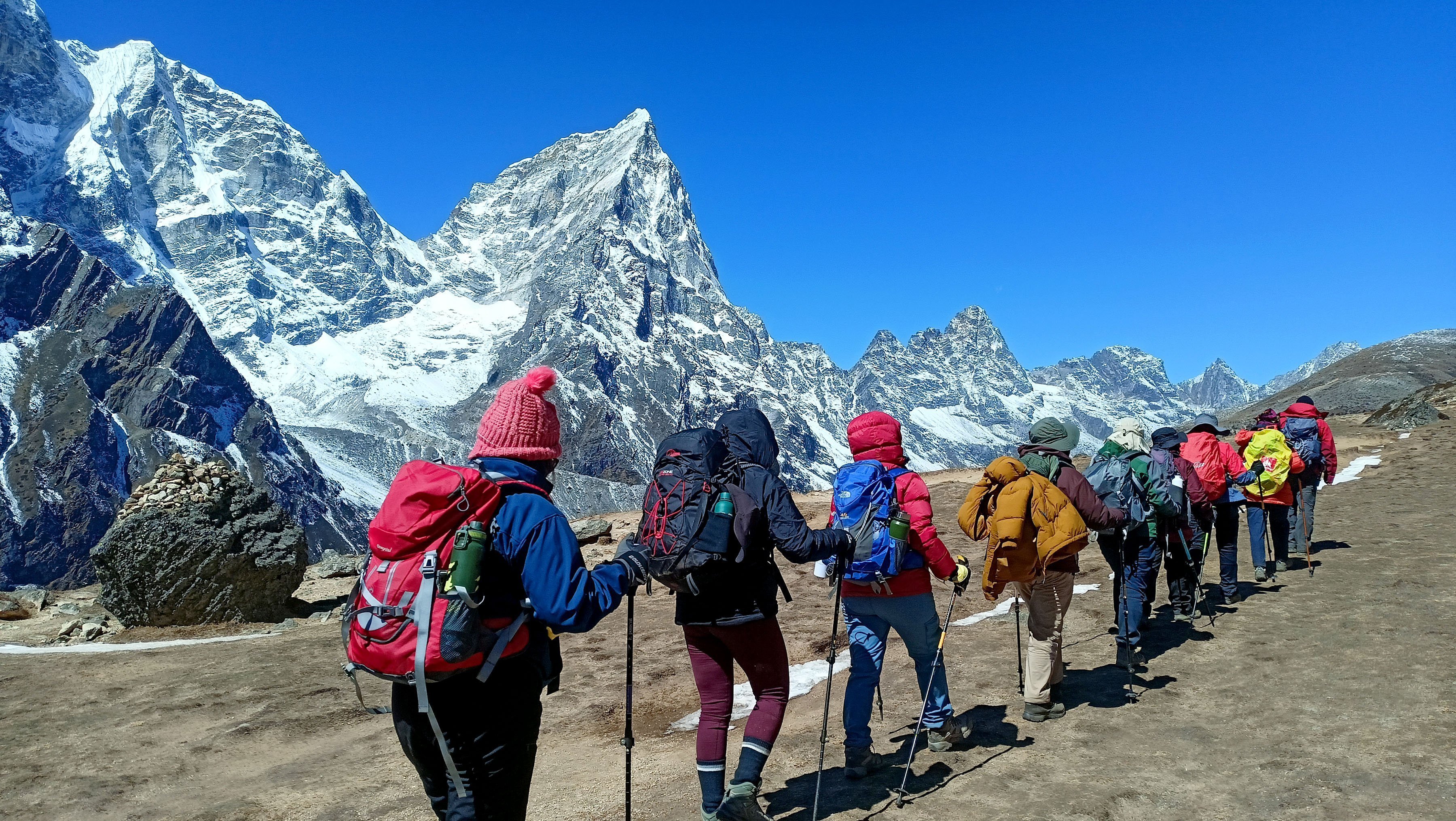 Work than festival celebration counts first for porters carrying loads for tourists