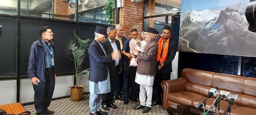 UML Chair Oli returns home from Cambodia