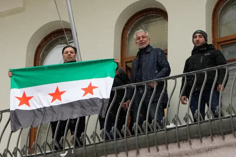 Photos: Syrian opposition flag raised at the Syrian embassy in Moscow