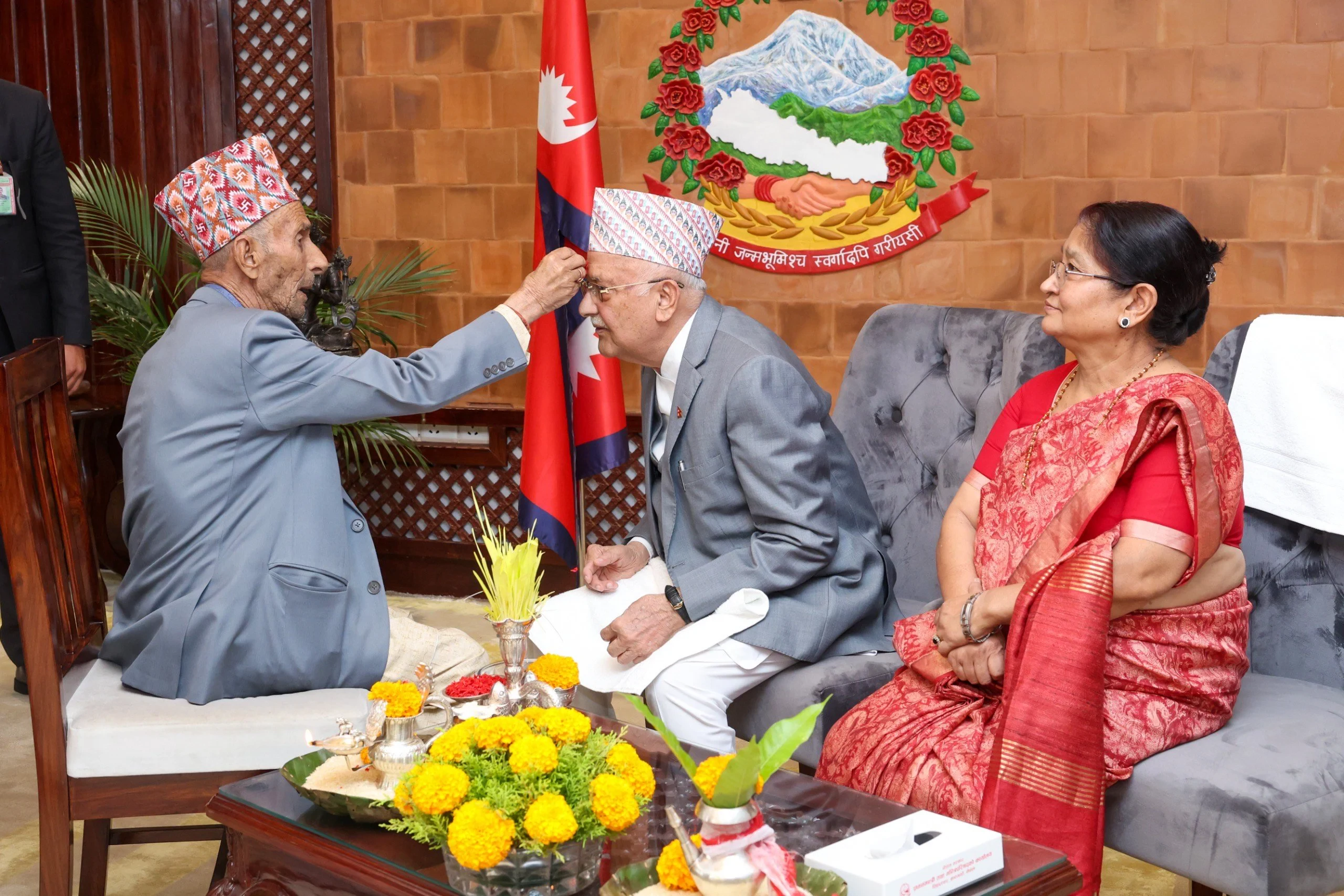 PM Oli receives Tika