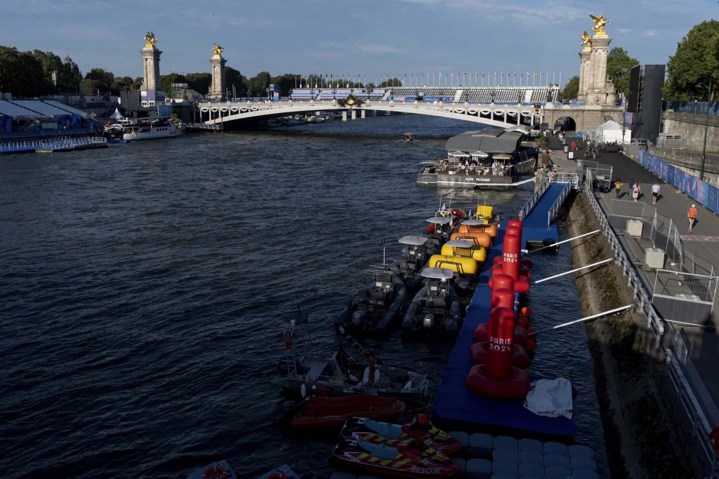 Men’s Olympic triathlon is postponed due to concerns over water quality in Paris’ Seine River