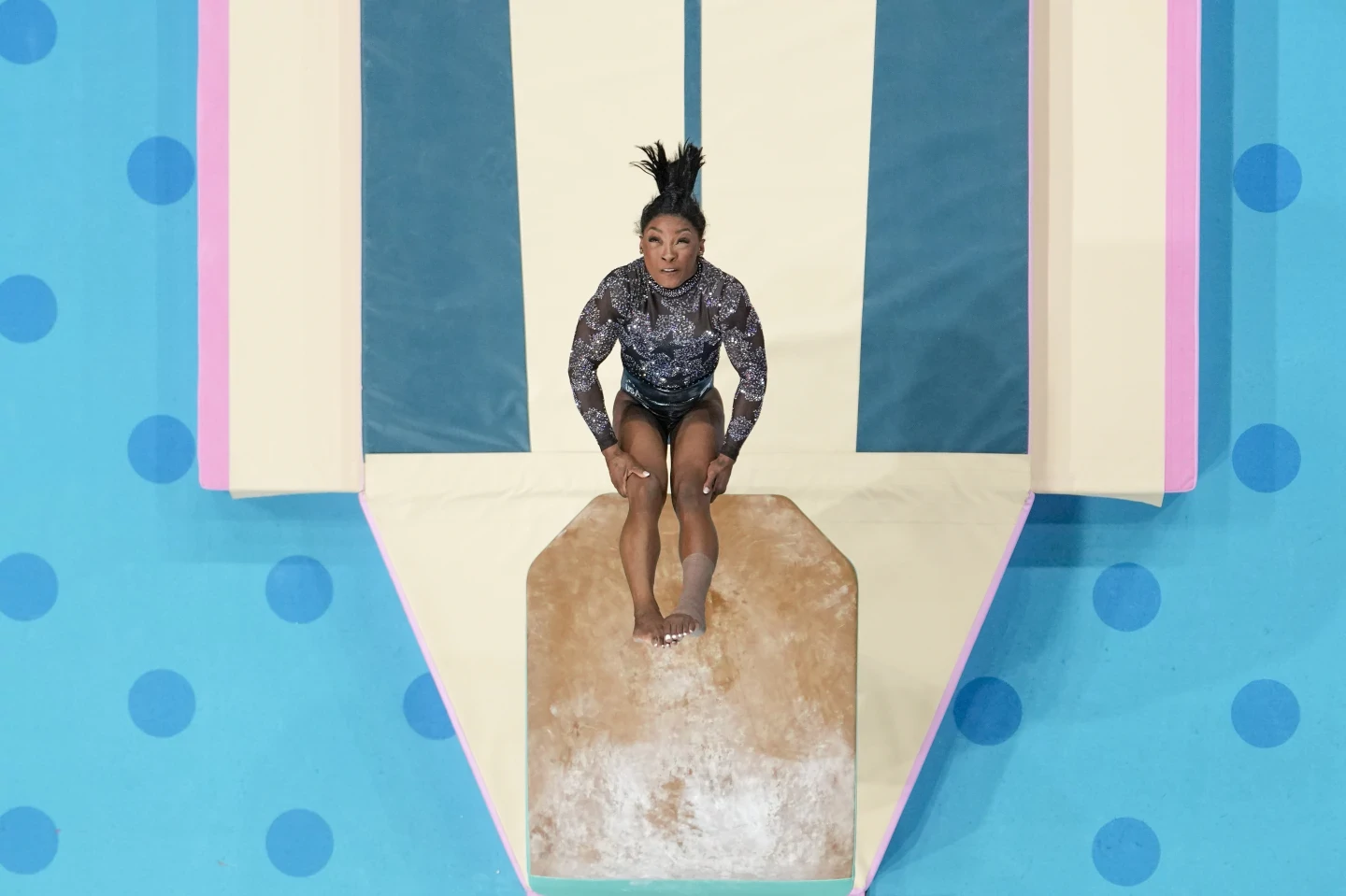 Simone Biles has redefined her sport — and its vocabulary. A look at the skills bearing her name