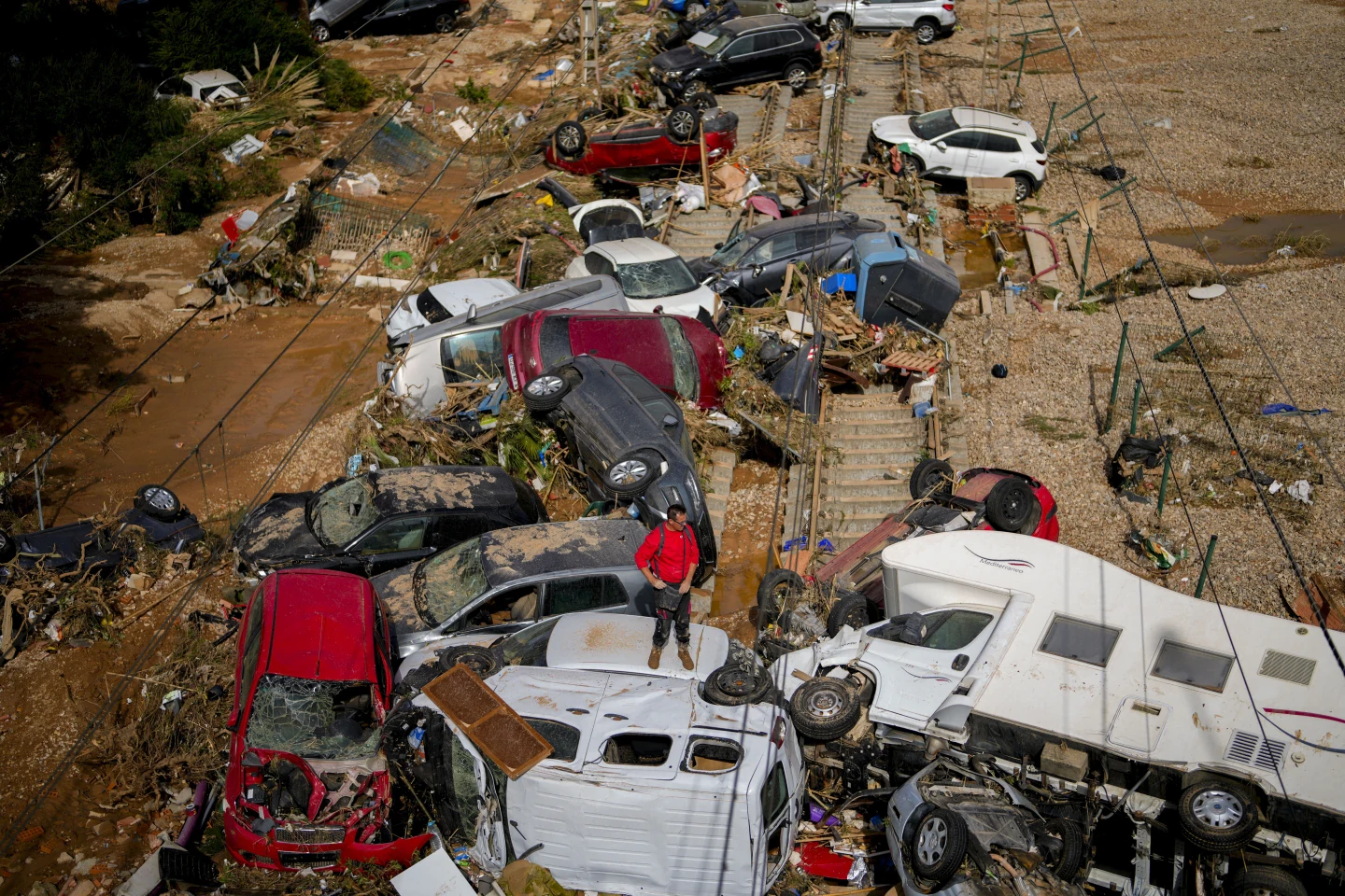 Spain searches for bodies after unprecedented flooding claims at least 158 lives