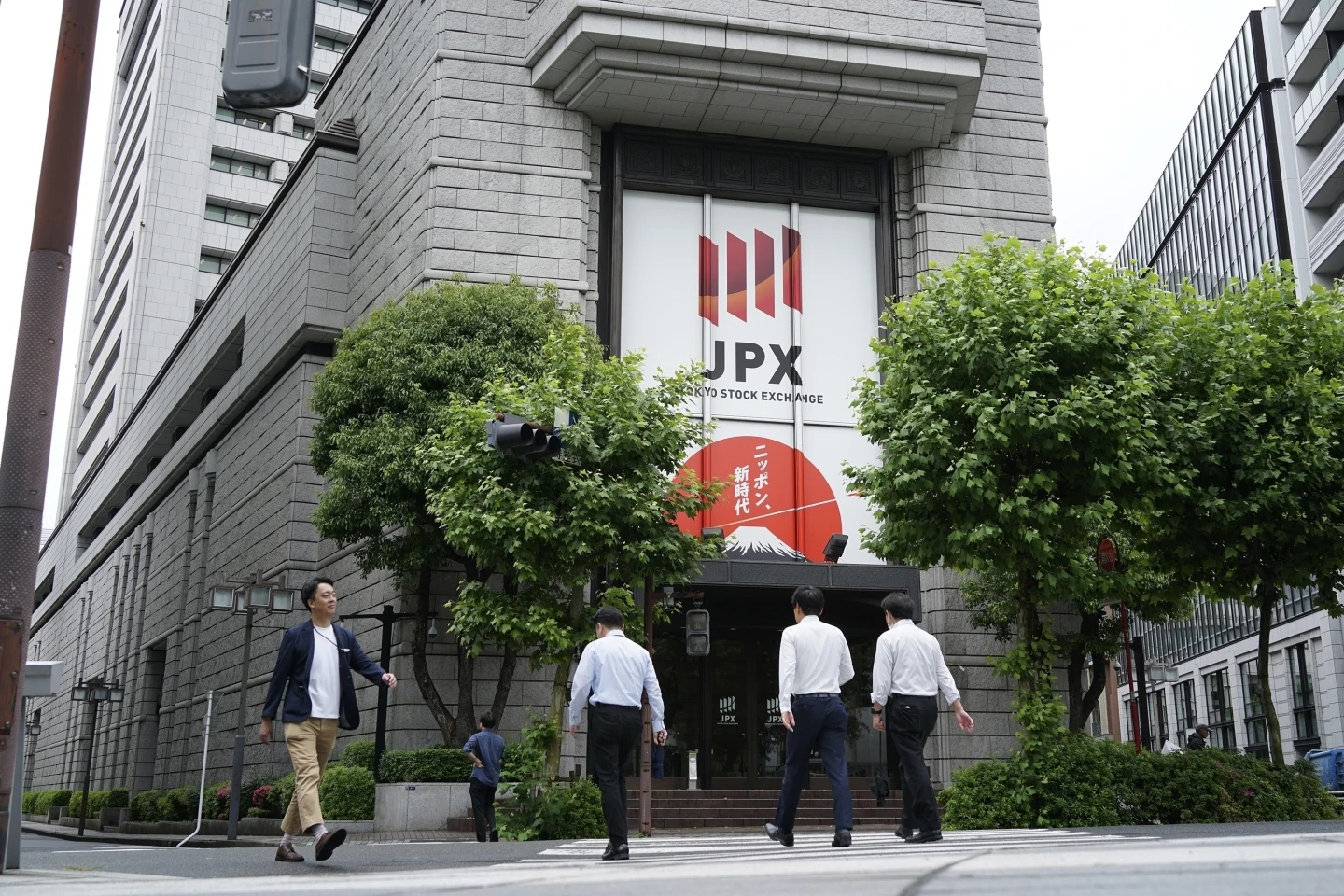 Asian stocks climb after Wall Street ends a record-setting week mixed